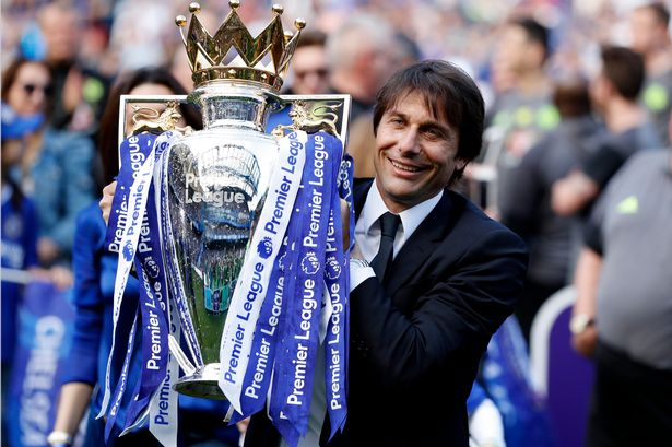 Chelsea-manager-Antonio-Conte-celebrates-with-the-trophy-after-winning-the-Premier-League